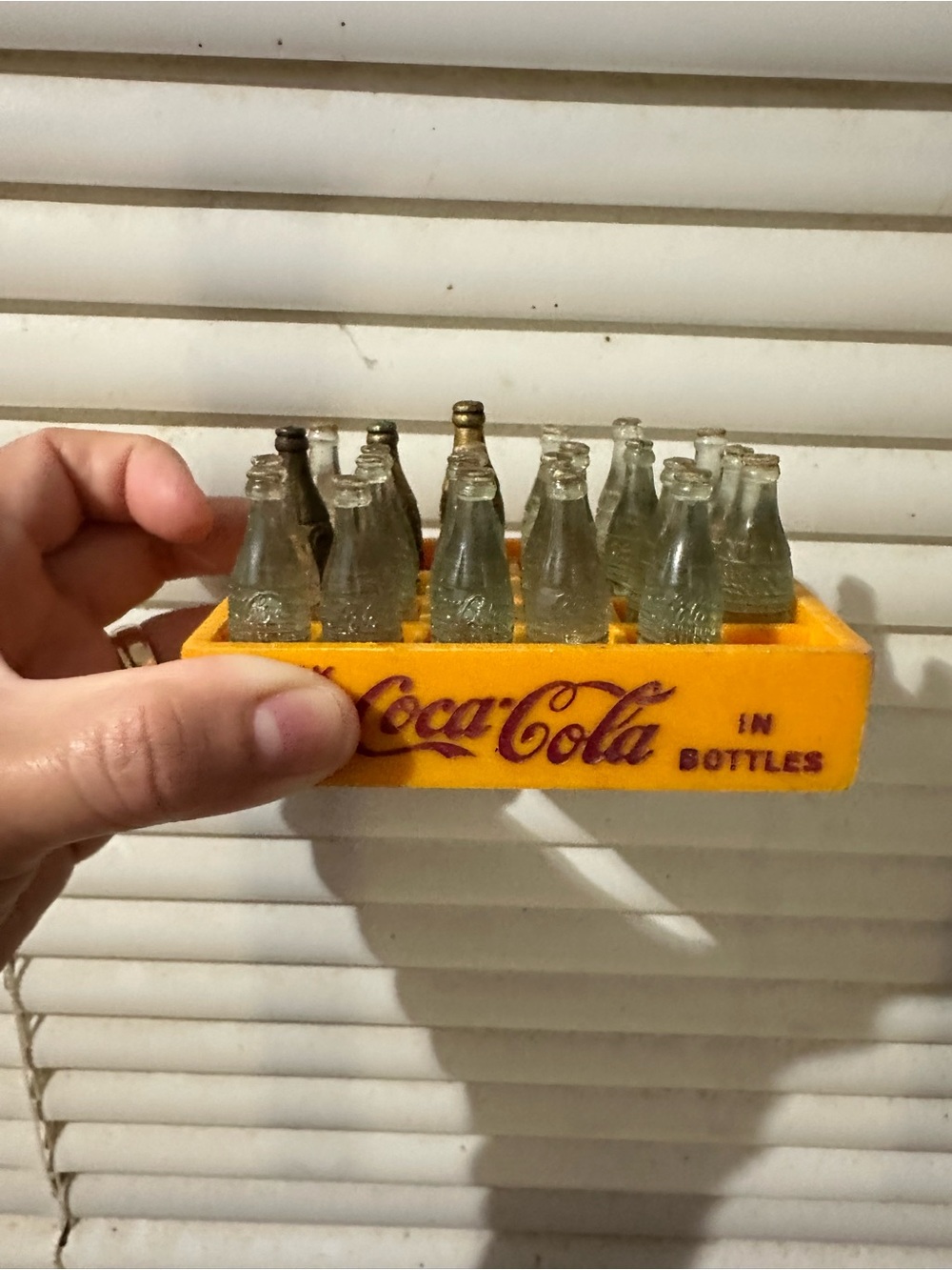 vintage miniature yellow Coca-Cola crate